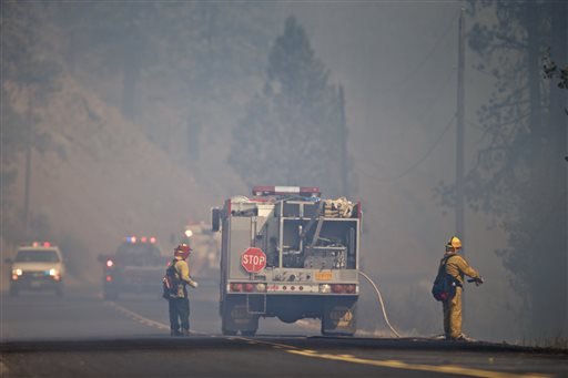 The fire is threatening Highway 180 which is the only way in and of the area officials said