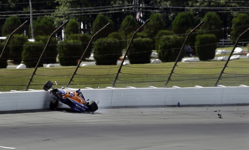 Charlie Kimball hits the wall in Turn 3 during qualifying at Pocono Raceway