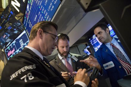 Stock futures little changed ahead of raft of data