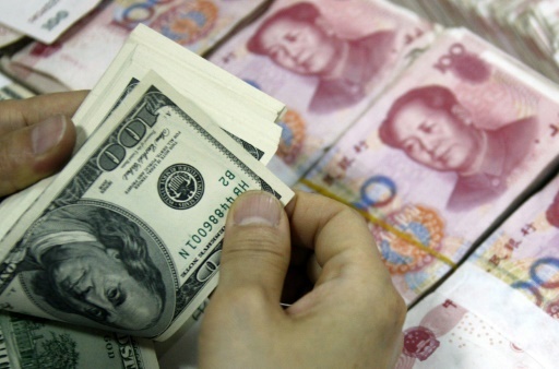 China cuts yuan rate against US dollar for second day