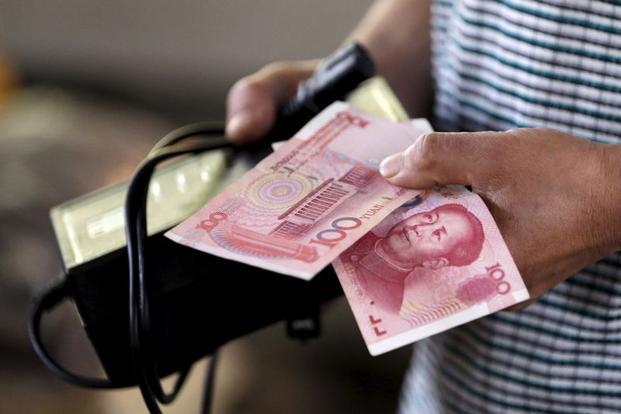 The reference rate for yuan was fixed 1.6% lower for Wednesday after a 1.9% cut the previous day