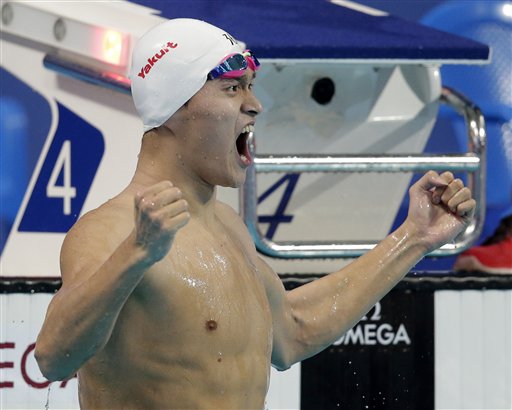 China's Sun Yang celebrates after winning the men's 400m freestyle final at the Swimming World Championships in Kazan Russia Sunday Aug. 2 2015