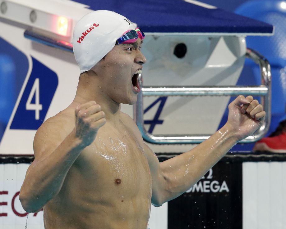 China's Sun Yang celebrates after winning the men's 400m freestyle final at the Swimming World Championships in Kazan Russia Sunday Aug. 2 2015