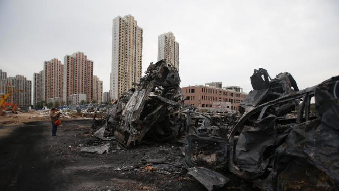 China blast zone evacuated over contamination fear 104 dead