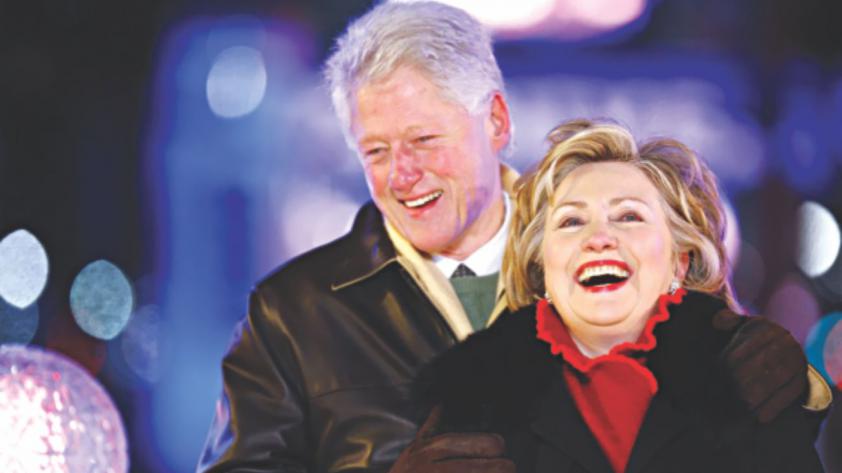 Democratic presidential candidate Hillary Rodham Clinton waves as she is introduced before speaking to the National Urban League Friday