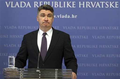 Croatia's prime minister Zoran Milanovic attends a press conference in Zagreb Croatia Wednesday Aug. 12 2015. Islamic State sympathizers circulated an image Wednesday that appears to show the grisly aftermath of the beheading of Tomislav Salopek a Cr