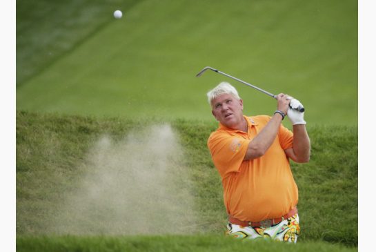 John Daly had a rough time on the seventh hole at the PGA Championship on Friday. After three of his tee shots ended up in the water he heaved his club into the lake too