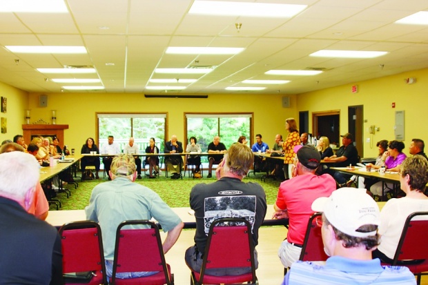 Debbie Griffin  Union Eagle More than 60 residents of Lake Mille Lacs gathered at McQuoid’s Inn July 23 for a meeting called by the DNR to talk about the possible closing of the lake to walleye fishing as early as Aug. 4