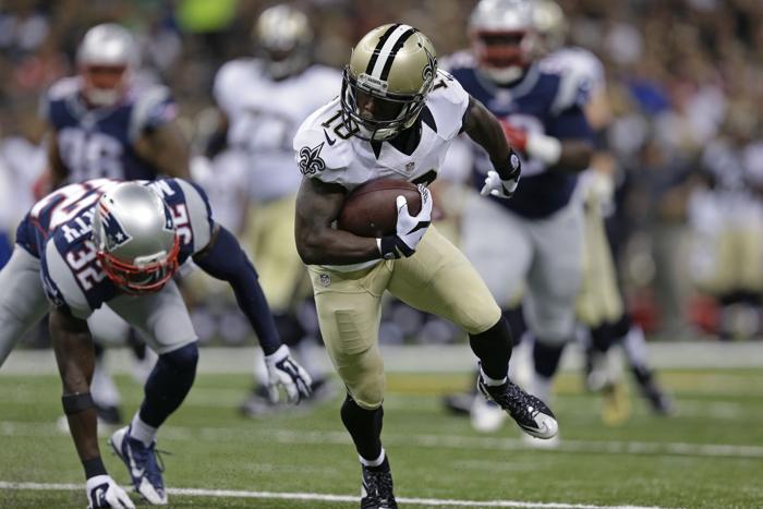 New Orleans Saints wide receiver Brandin Cooks carries past New England Patriots free safety Devin Mc Courty in the first half of a preseason NFL football game in New Orleans