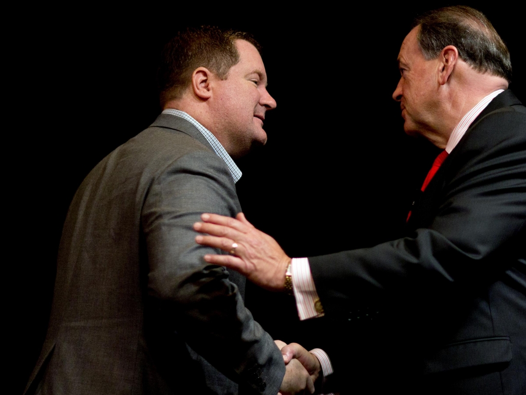 RedState editor-in-chief Erick Erickson greets GOP presidential candidate Mike Huckabee on Saturday at the Red State Gathering in Atlanta