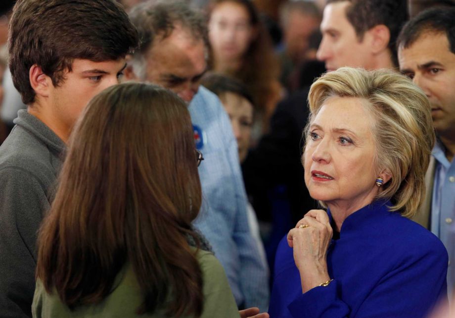 Democratic presidential candidate Hillary Rodham Clinton listens as she meets with voters during a campaign stop at River Valley Community College in Claremont N.H. Clinton has relented to months of demands that