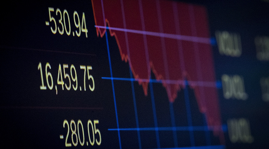 A screen shows the final tally for the Dow Jones Industrial Average on the floor of the New York Stock Exchange