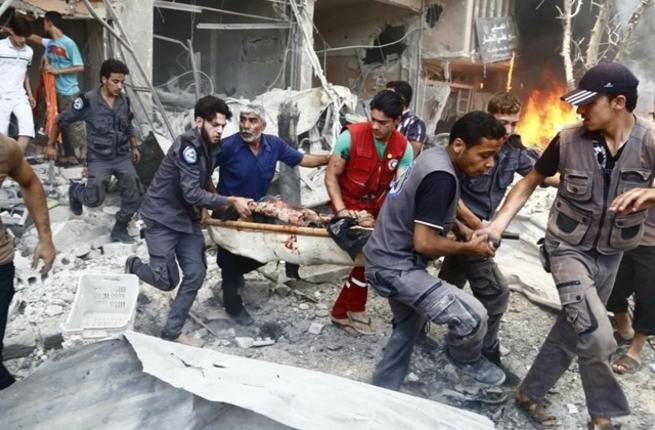 Dozens of civilians were wounded in another bloody day of clashes in the Syrian capital