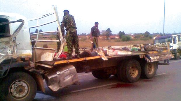 Dead bodies lay on the back of a truck yesterday near Swaziland’s capital Mbabane after tens of girls and young women were killed in a crash while travelling to a famous traditional festival on Friday. The truck they were travelling in collided with ano