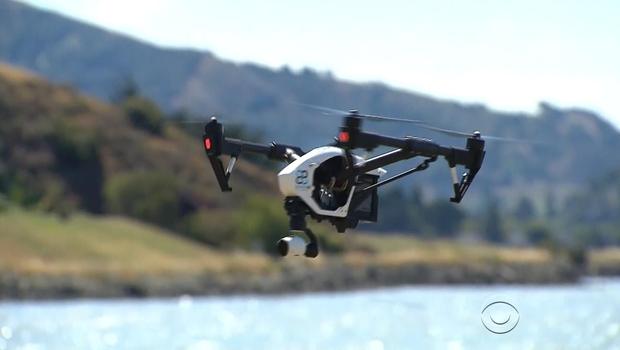 Drones being flown too high or too close to airports are attracting the concern of the FAA.               CBS News