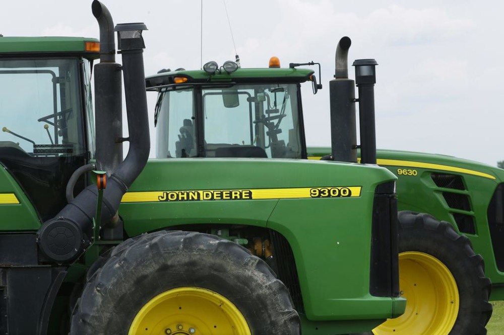 John Deere farming equipment on display for sale at a dealership in Petersburg Ill Deere and Co reports quarterly financial results