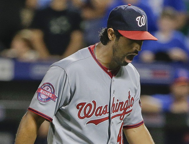 Washington Nationals pitcher Gio Gonzalez reacts after striking out New York Mets Eric Campbell with the bases loaded to end the fourth inning of a baseball game Friday