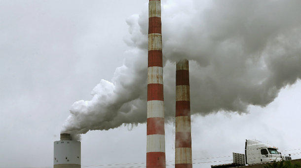 Emissions spew out of a large stack at the coal-fired Morgantown Generating Station in Newburg Maryland.&nbsp