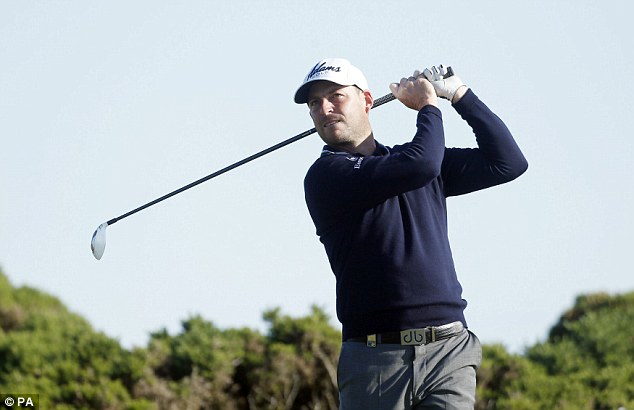 England's David Howell watches his shot on the third tee duirng the Energy Paul Lawrie Match Play