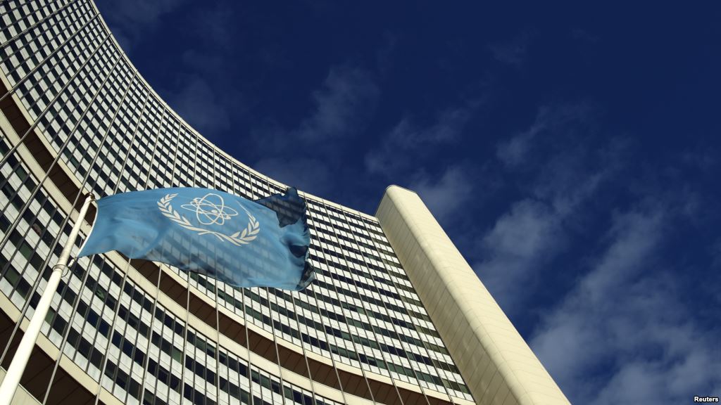 FILE- The flag of the International Atomic Energy Agency flies in front of its headquarters in Vienna Austria