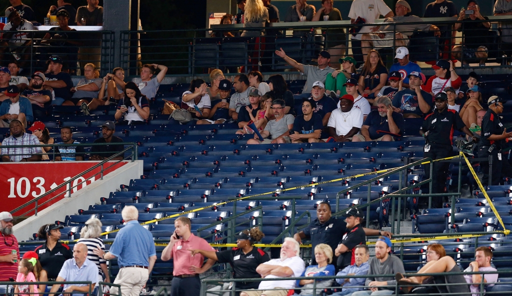 ATLANTA GA- AUGUST 29 Police block off a section with police tape after a fan fell from the upper deck of Turner Field in the seventh inning during the game between the Atlanta Braves and the New York Yankees