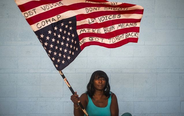 Michael Brown Sr urges protesters to step up efforts on shooting anniversary