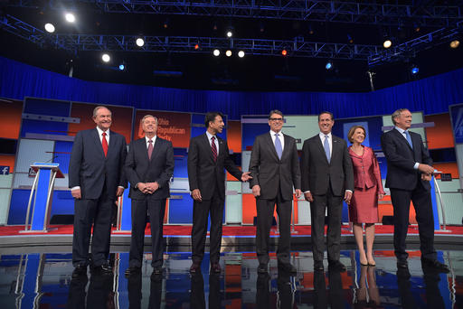 Republican presidential hopefuls arrive on stage for the start of the Republican presidential primary debate on Aug. 6 2015 at the Quicken Loans Arena in Cleveland Ohio