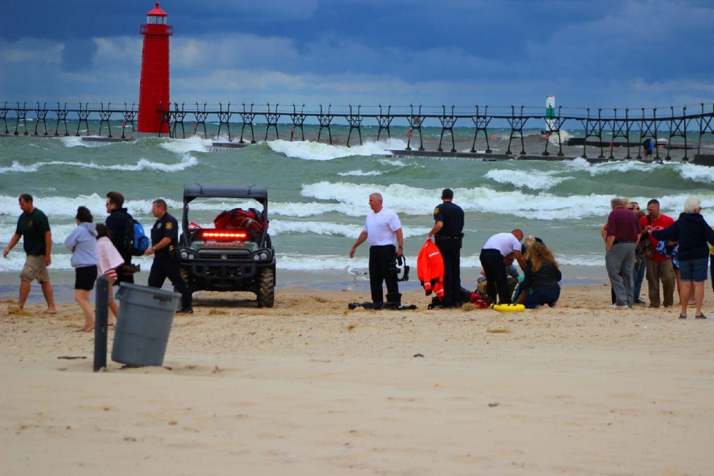 Surfer rescues teens Grand Haven