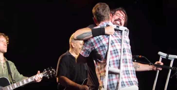 Foo Fighters singer Dave Grohl brings crying fan on stage for duet