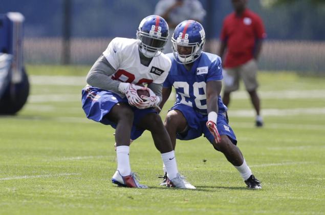 A day after signing with the Giants James Jones takes the field