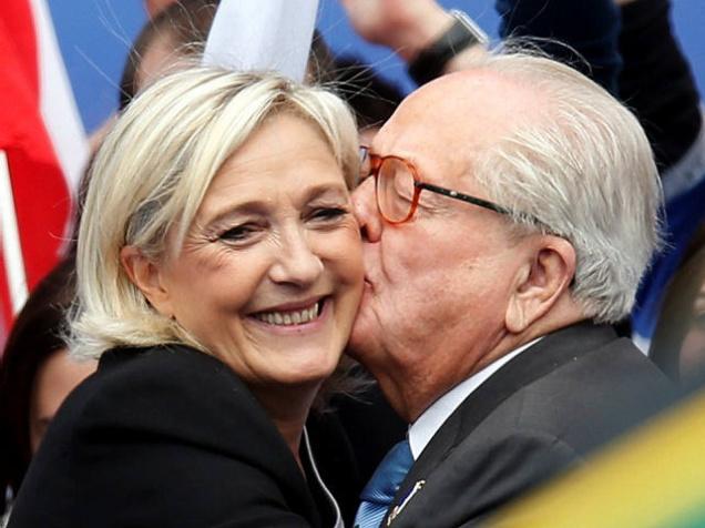 JeanMarie Le Pen, France's National Front political party founder embraces his daughter Marine Le Pen National Front political party leader after her speech at their traditional rally in Paris in this