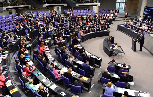 Volker Kauder parliamentary group leader of the conservative Christian Democratic Union, delivers his speech during a debate ahead of a vote on a third bailout for debtmired Greece at German lower house of parliament in Berlin