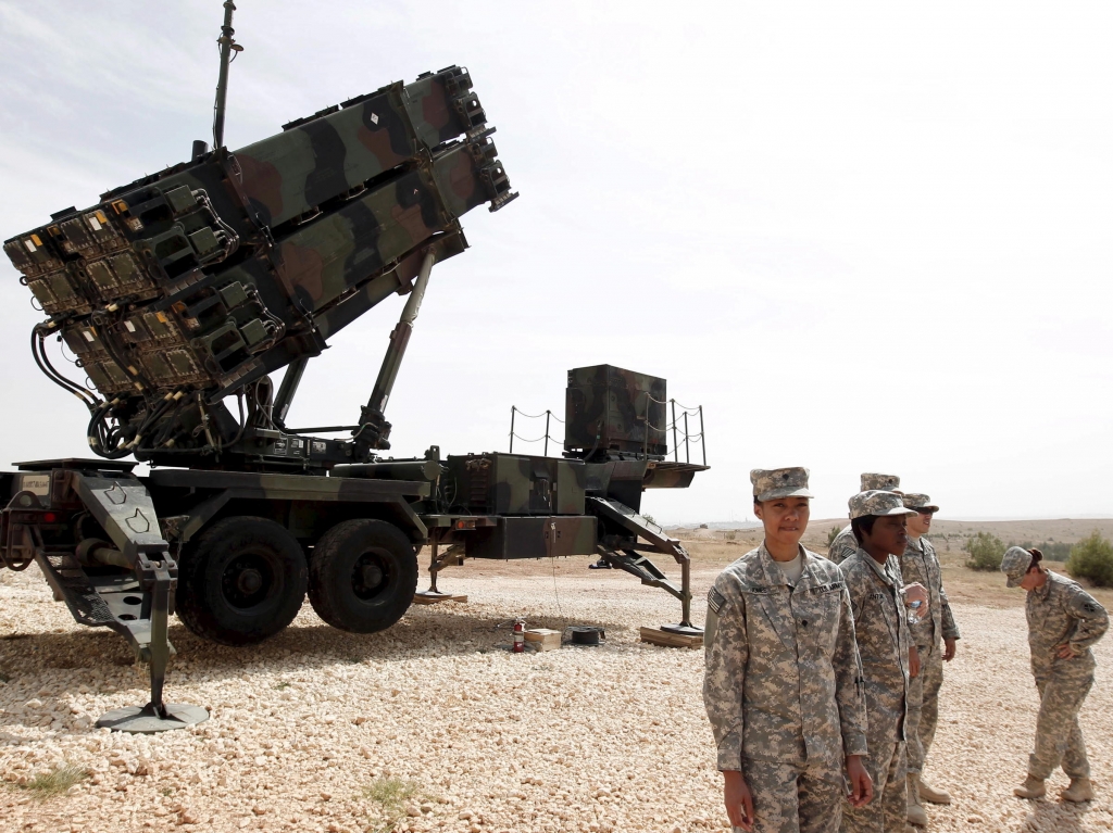 U.S. soldiers stand beside a Patriot missile system at a Turkish military base in Gaziantep southeastern Turkey last October. In a joint statement Washington and Ankara said the missiles would be withdrawn for updating and modernization