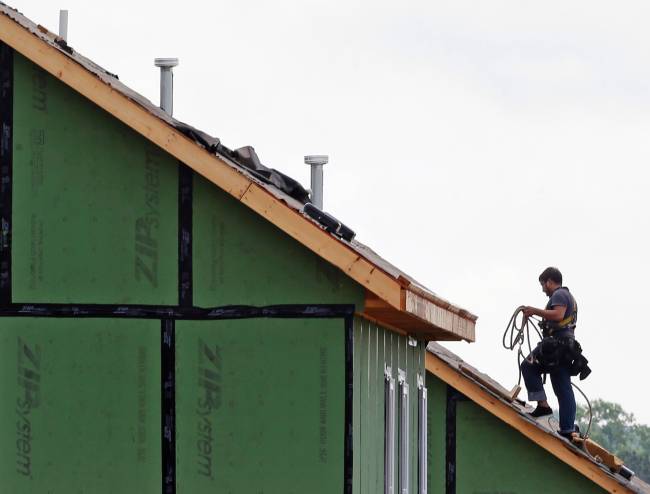 9 2015 a roofer works on a home under construction in the Briar Chapel community in Chapel Hill N.C