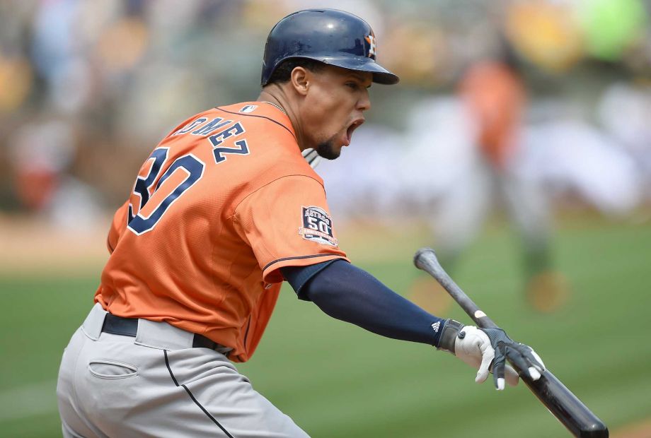 The Astros Carlos Gomez is not happy with his flyout to right field in the first inning of Saturday's game at Oakland Calif. He went 0-for-3 in the loss