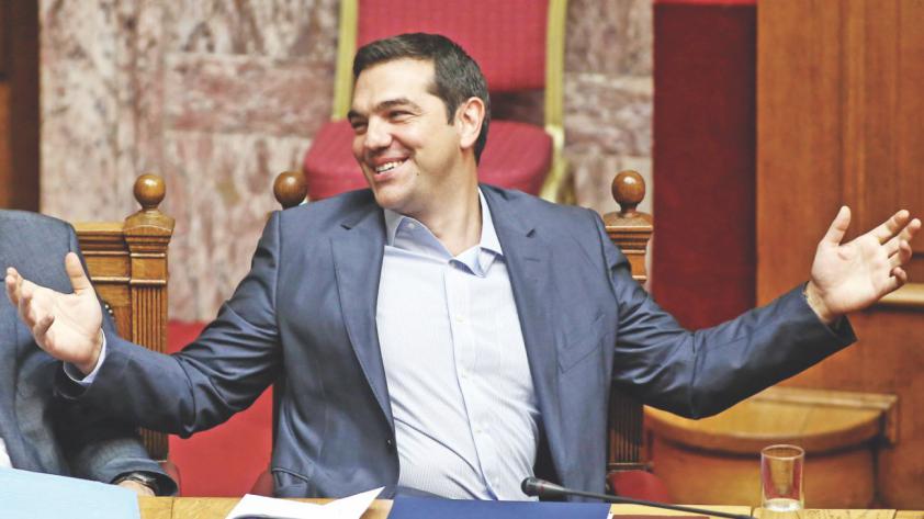 Greek Prime Minister Alexis Tsipras leaves his office at Maximos Mansion in Athens Greece