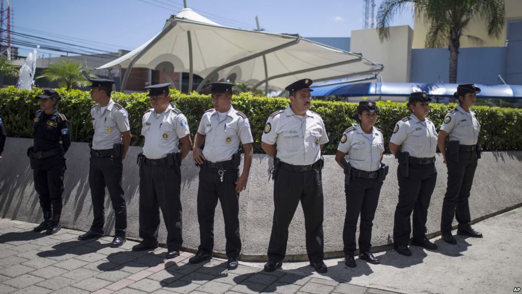 Police stand guard outside a private hospital where Guatemala's former Vice President Roxana Baldetti is being treated and where she was detained in connection with a customs corruption scandal in Guatemala City