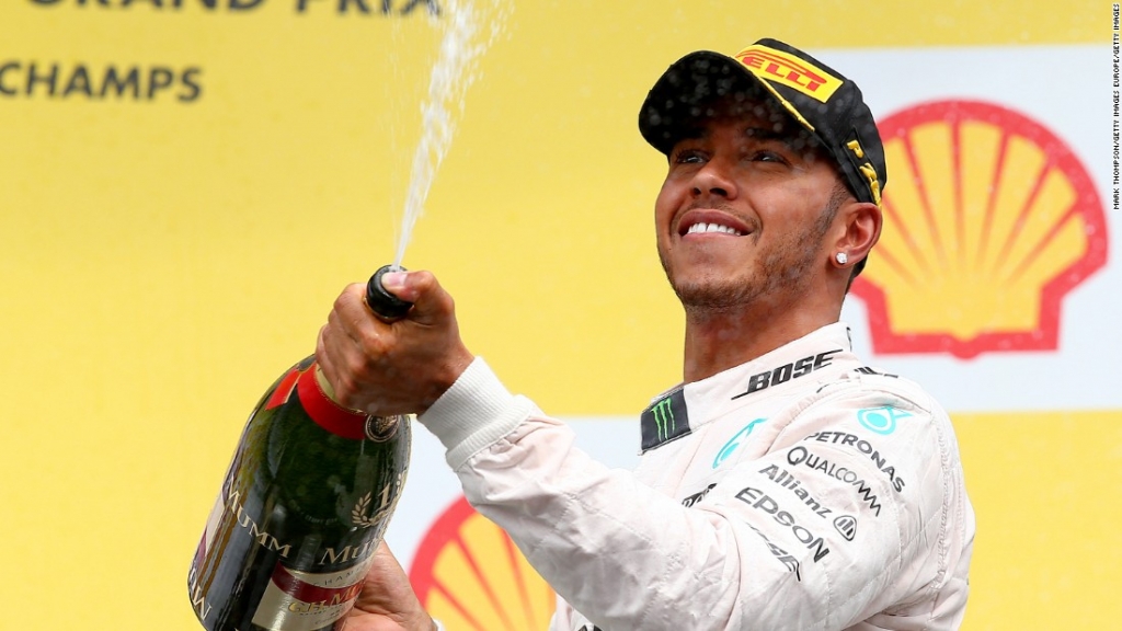 Lewis Hamilton celebrates after winning the Belgian Grand Prix at Spa Francorchamps