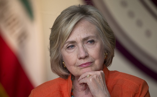 Democratic presidential candidate Hillary Rodham Clinton listens to a home care worker during a roundtable discussion in Los Angeles. Calling for a new college compact, Hillary Rodham Clinton on Monda