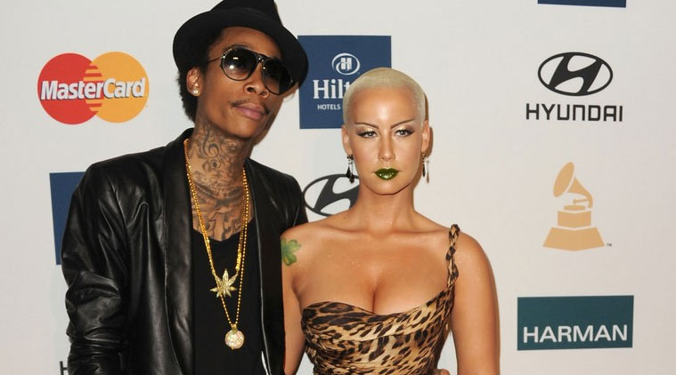 Hip-hop model Amber Rose was spotted hanging out with estranged husband Wiz Khalifa after her split from rapper Machine Gun Kelly