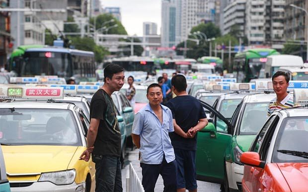 Hong Kong Police Detain Three Uber Employees After Office Raid