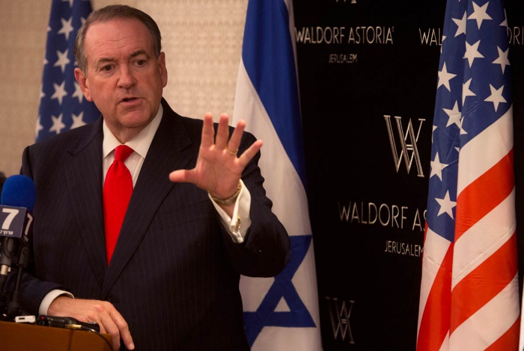 Republican presidential hopeful Mike Huckabee gestures as he speaks during a press conference in Jerusalem Wednesday Aug. 19 2015