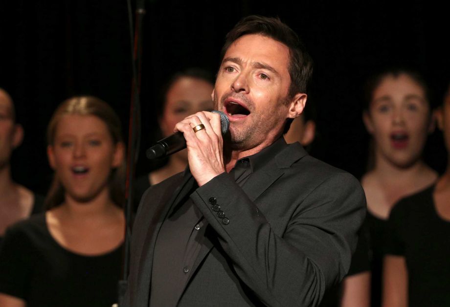 Actor Hugh Jackman sings on stage before holding a press conference where he announced his new stage show'Broadway to OZ in Sydney Australia Monday Aug. 24 2015. Jackman is returning to Australia for a five-city arena concert tour in November and De