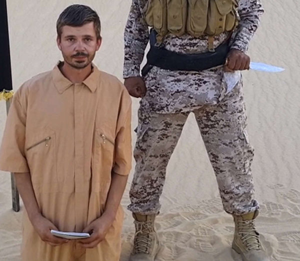 In a militant video posted Aug. 5 a man who identifies himself as Tomislav Salopek kneels at an unknown location