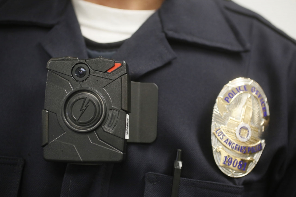 Los Angeles Police officer wears an on-body camera during a demonstration for media