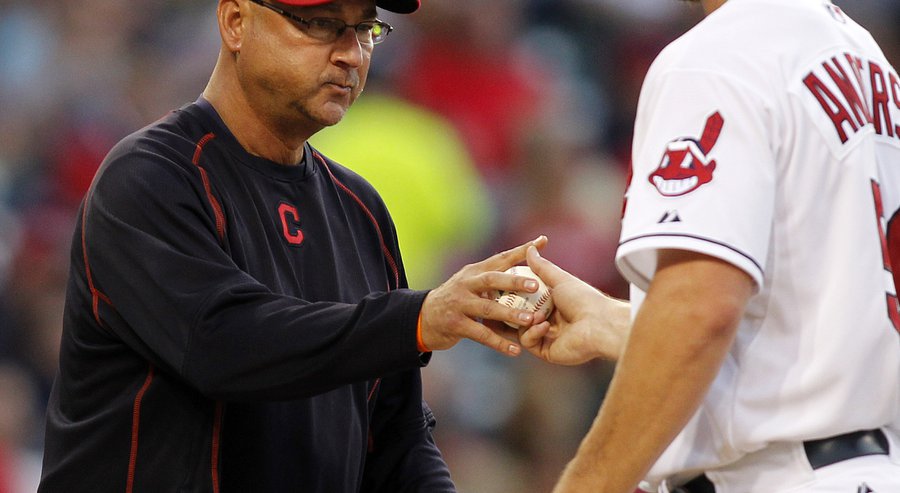 Cleveland Indians manager Terry Francona left takes the ball from starting pitcher Cody Anderson who leaves a baseball game in the third inning against the Minnesota Twins Friday Aug. 7 2015 in Cleveland