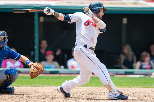 Jason Kipnis #22 of the Cleveland Indians hits an RBI single during the sixth inning against the Kansas City Royals at Progressive Field