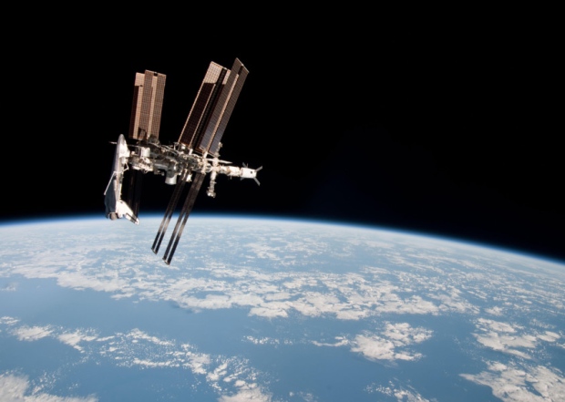 International Space Station and the docked space shuttle Endeavour left at an altitude of approximately 220 miles