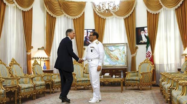 Britain’s Foreign Secretary Philip Hammond shakes hands with Ali Shamkhani secretary of the Iranian Supreme National Security Council in Tehran Iran yesterday