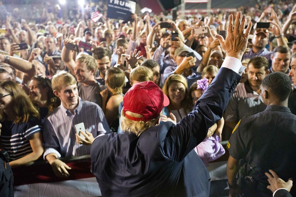 Republican presidential candidate Donald Trump waves to the crowd during a campaign pep rally